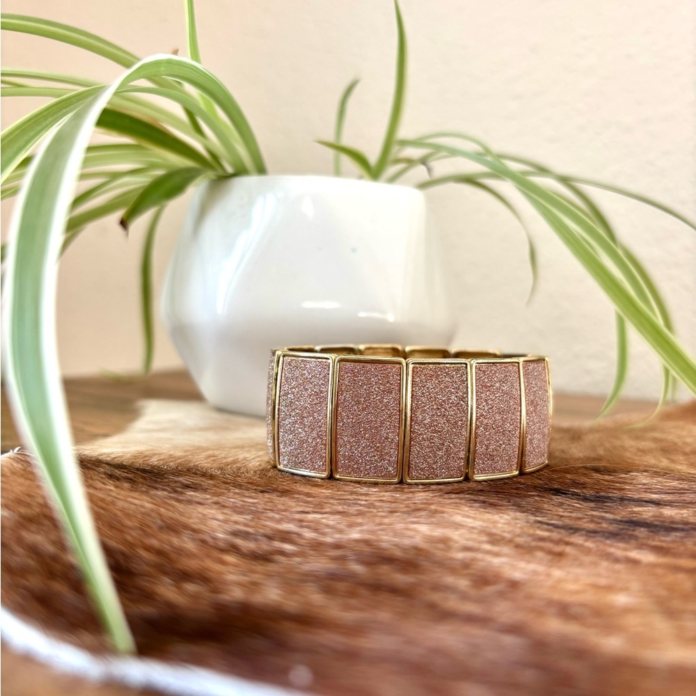 Elegant Gold and Pink Bracelet